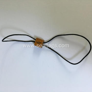 Plastic tags with string together paper tag